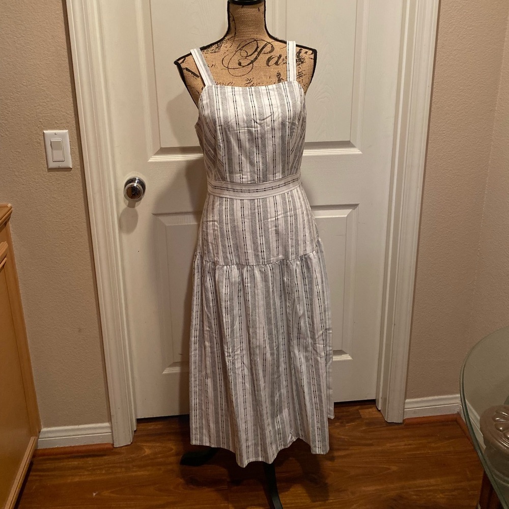 Black and white striped tiered dress.